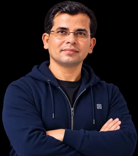 Bishal Saha in a navy hoodie, arms crossed